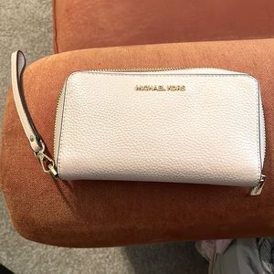 Pink Michael Kors Wallet with wristlet strap if you want it!